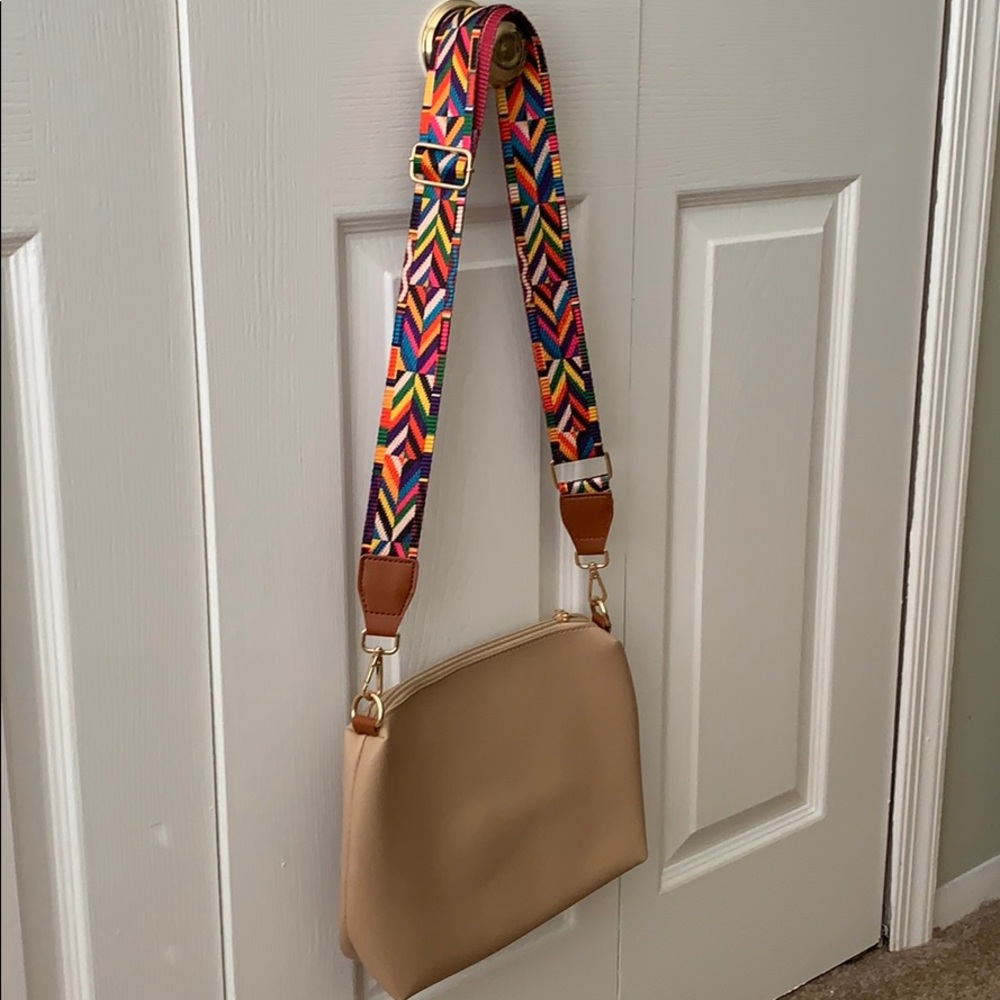 Cross body bag with colorful strap